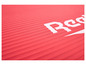 Ružová jogamatka s logom Reebok.