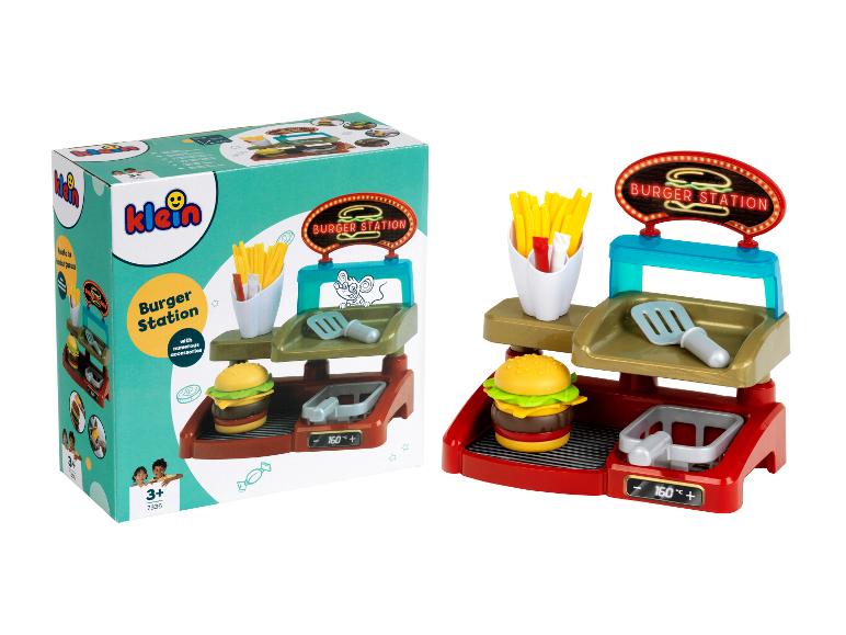 Súprava hračiek Klein Burger Station s krabicou a hračkou s burgerom, hranolkami a špachtľou.