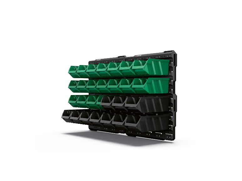 Nástenný úložný panel PARKSIDE so zelenými a čiernymi úložnými boxmi.
