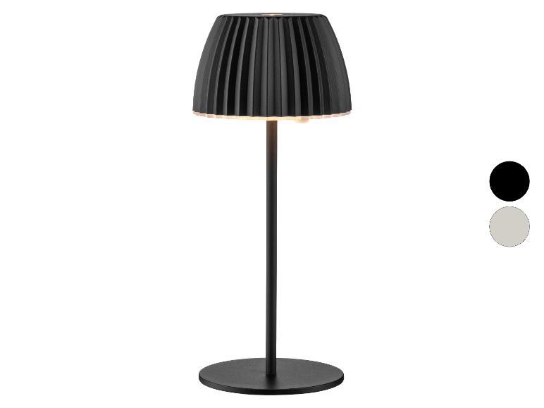 Čierna stolná lampa s plisovaným tienidlom a dvoma farebnými variantmi.