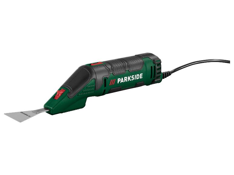 Zelené a čierne elektrické náradie s kovovou čepeľou a čiernym káblom.