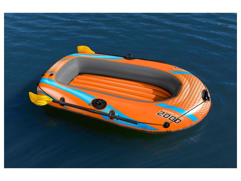 Oranžový nafukovací čln Condor Elite 2000 s veslami.