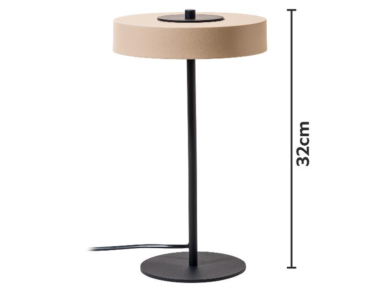 Béžová stolová lampa s čiernym stojanom a podstavcom, vysoká 32 cm.