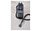 Čistič kobercov SilverCrest X20V Team s hadicou a hubicou na bielom koberci.