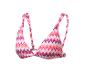Bikini top s farebným cikcak vzorom, ideálny na pláž.