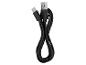Čierny USB-C nabíjací kábel s USB-A konektorom, stočený do osmičky.