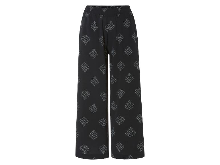 Široké čierne nohavice s potlačou listov.