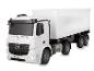 Biely model nákladného auta Mercedes-Benz Actros s prívesom.