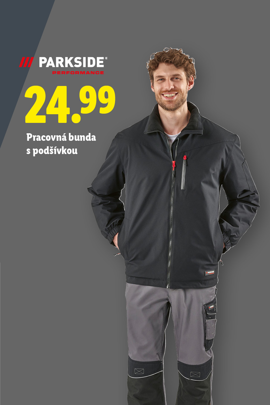 Muž v čiernej bunde Parkside Performance a sivých pracovných nohaviciach.