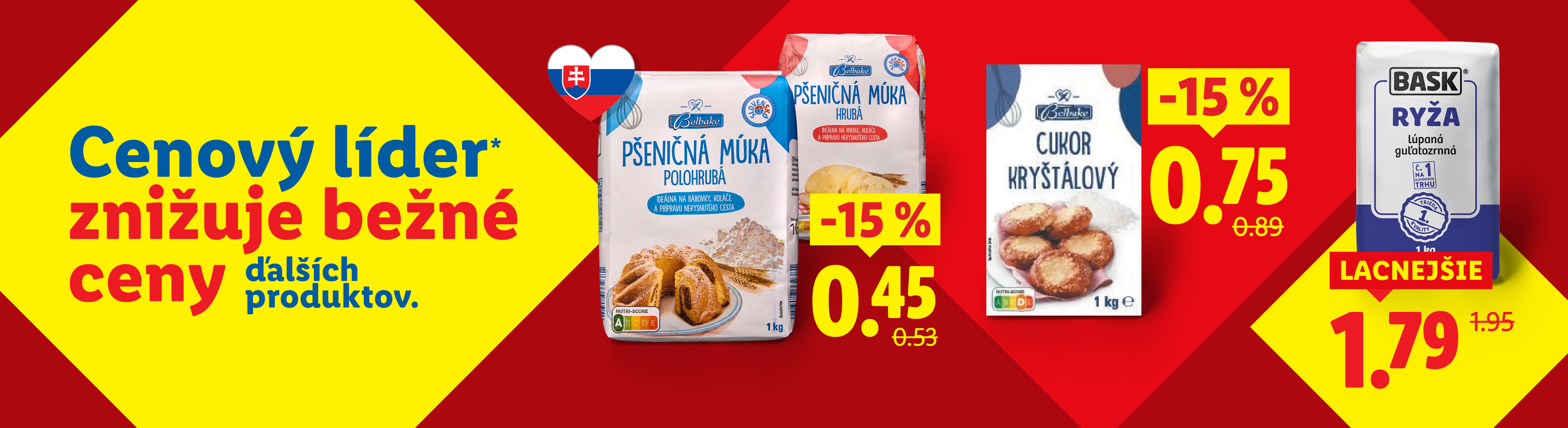 Slogan „Cenový líder znižuje bežné ceny ďalších produktov“. Pšeničná múka 1 kg za 0,45, Kryštálový cukor 1 kg za 0,75, ryža 1 kg za 1,79.