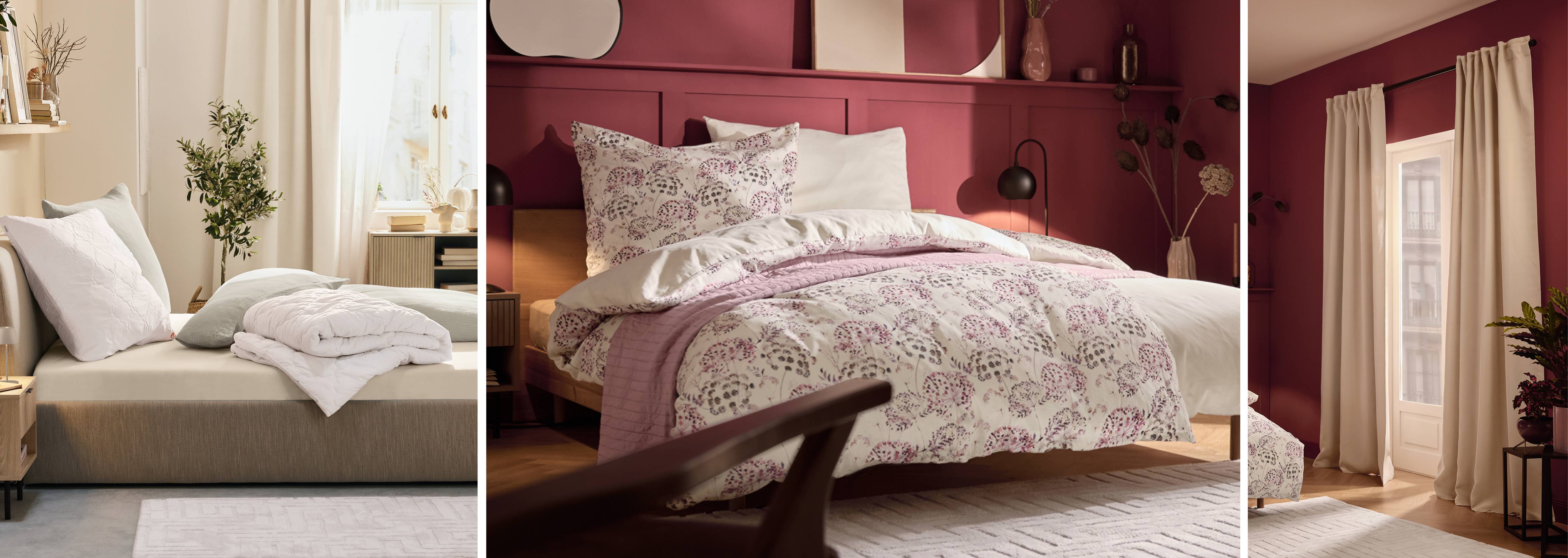 Spálňa s posteľou s bielym a fialovým kvetinovým vzorom a béžovými závesmi.