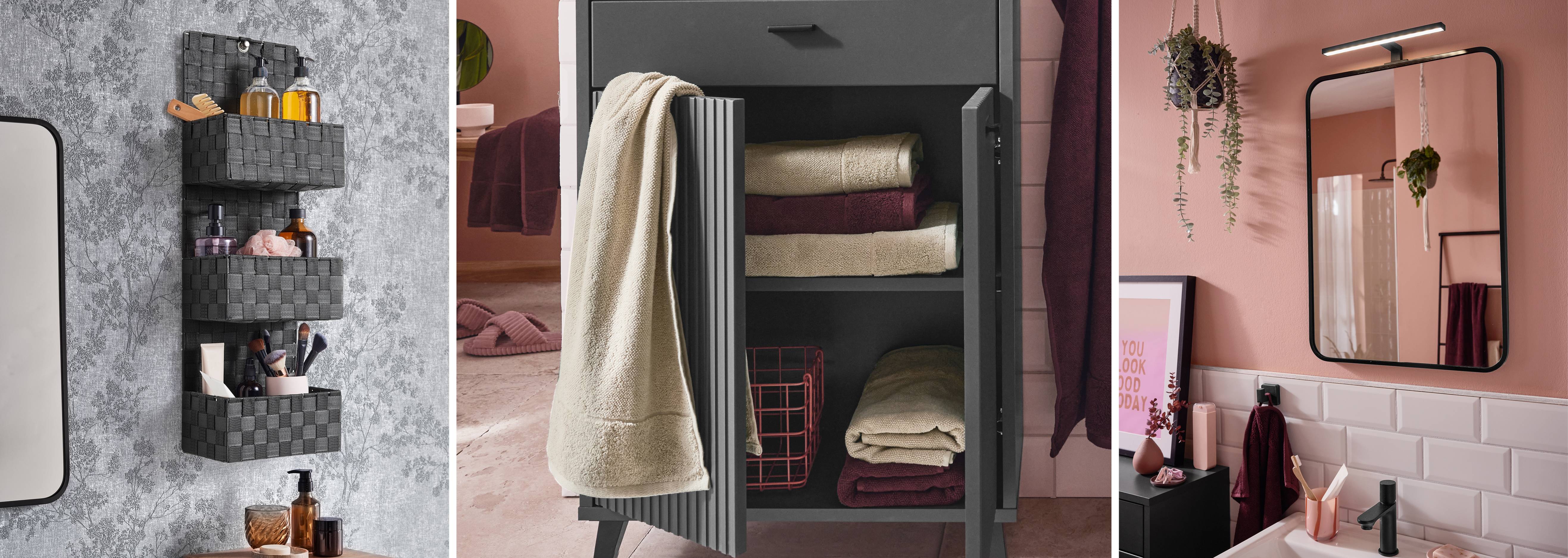 Kúpeľňa s úložným priestorom, uterákmi a zrkadlom.