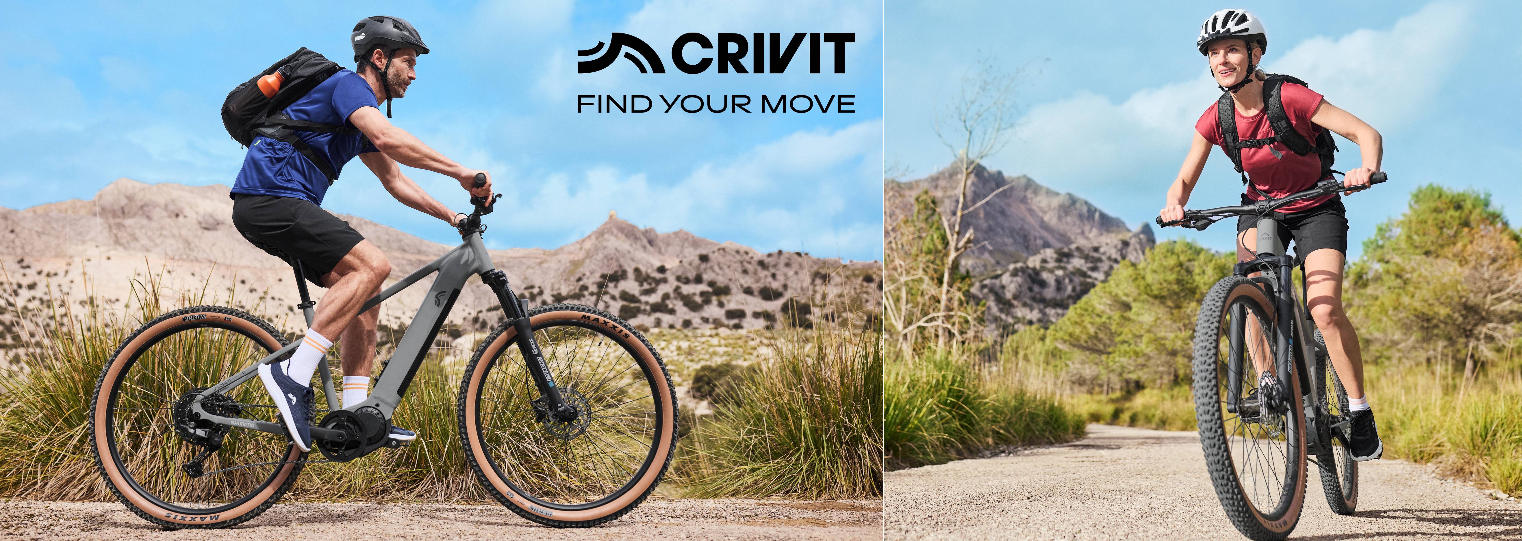 Dve osoby jazdia na horských bicykloch Crivit v krásnej prírodnej scenérii.