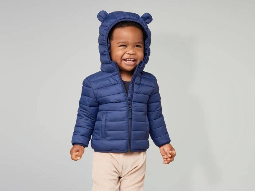 Detská tmavomodrá prešívaná bunda s kapucňou a uškami.